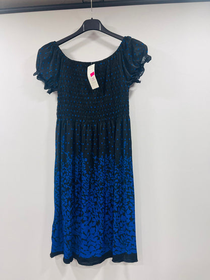 Casual Smocked Midi Dress with Mixed Polka Dot and Botanical Patterns
